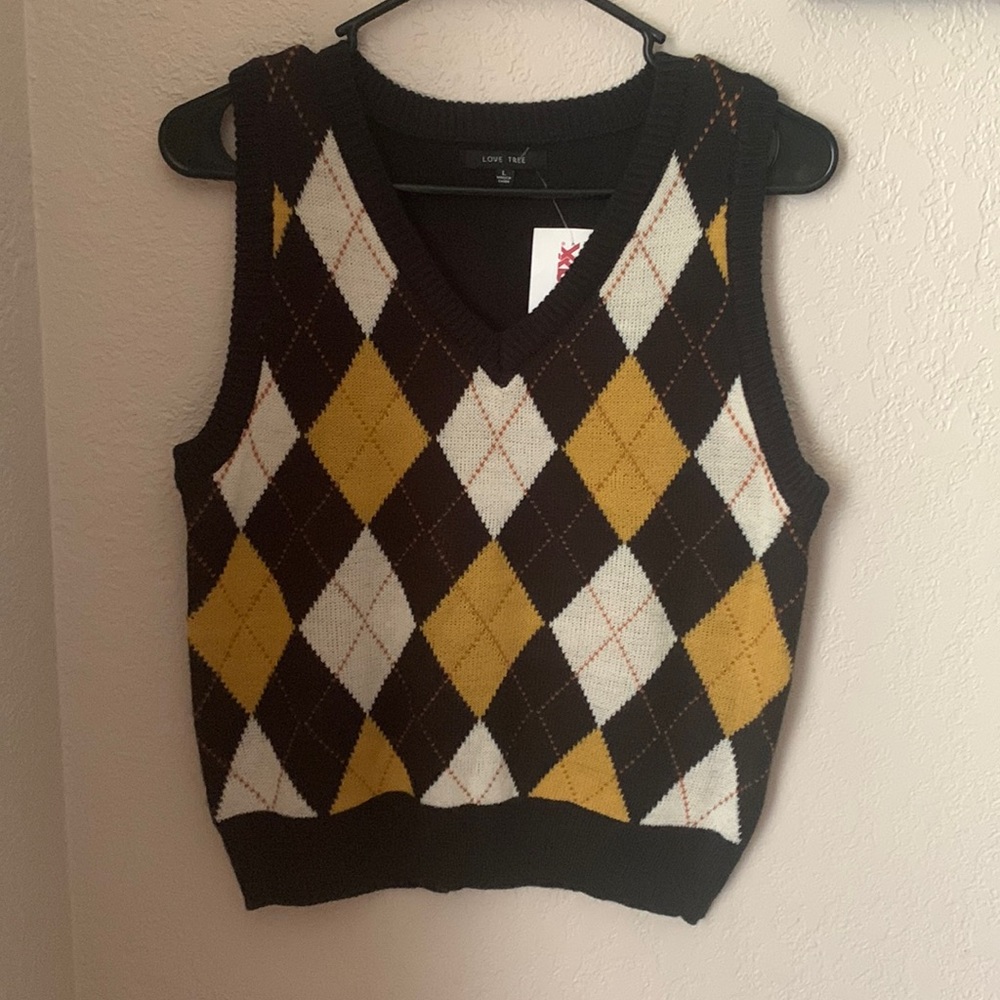 New with tags. TJ Max vest